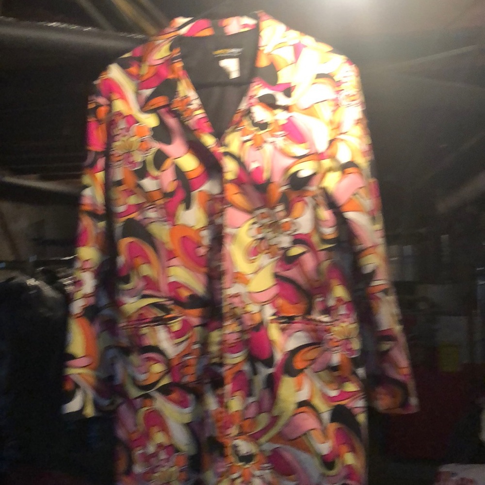 A lady designer coat , very stylist
